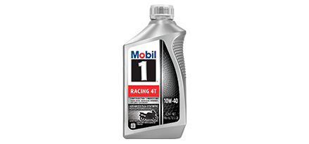 Botella de aceite 10w40 para moto de color plateado con tapa de rosca visto desde el frente